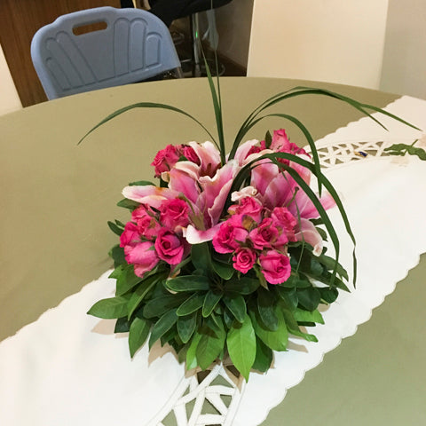 Roses And Stargazer In A Vase