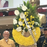 Circular wreath yellow radost with white anthuriums and orchids
