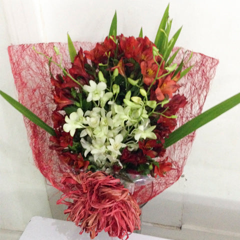 Orchids with alstroemeria