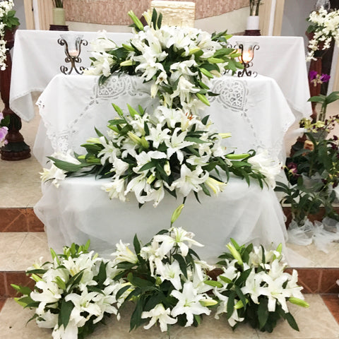 White lilies sympathy arrangement