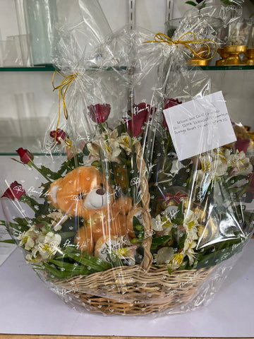 1 DOZEN ROSES in a  BASKET WITH TEDDY BEAR IN A BASKET