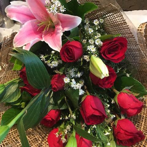 Bouquet of 12 Red Roses with Stargazer